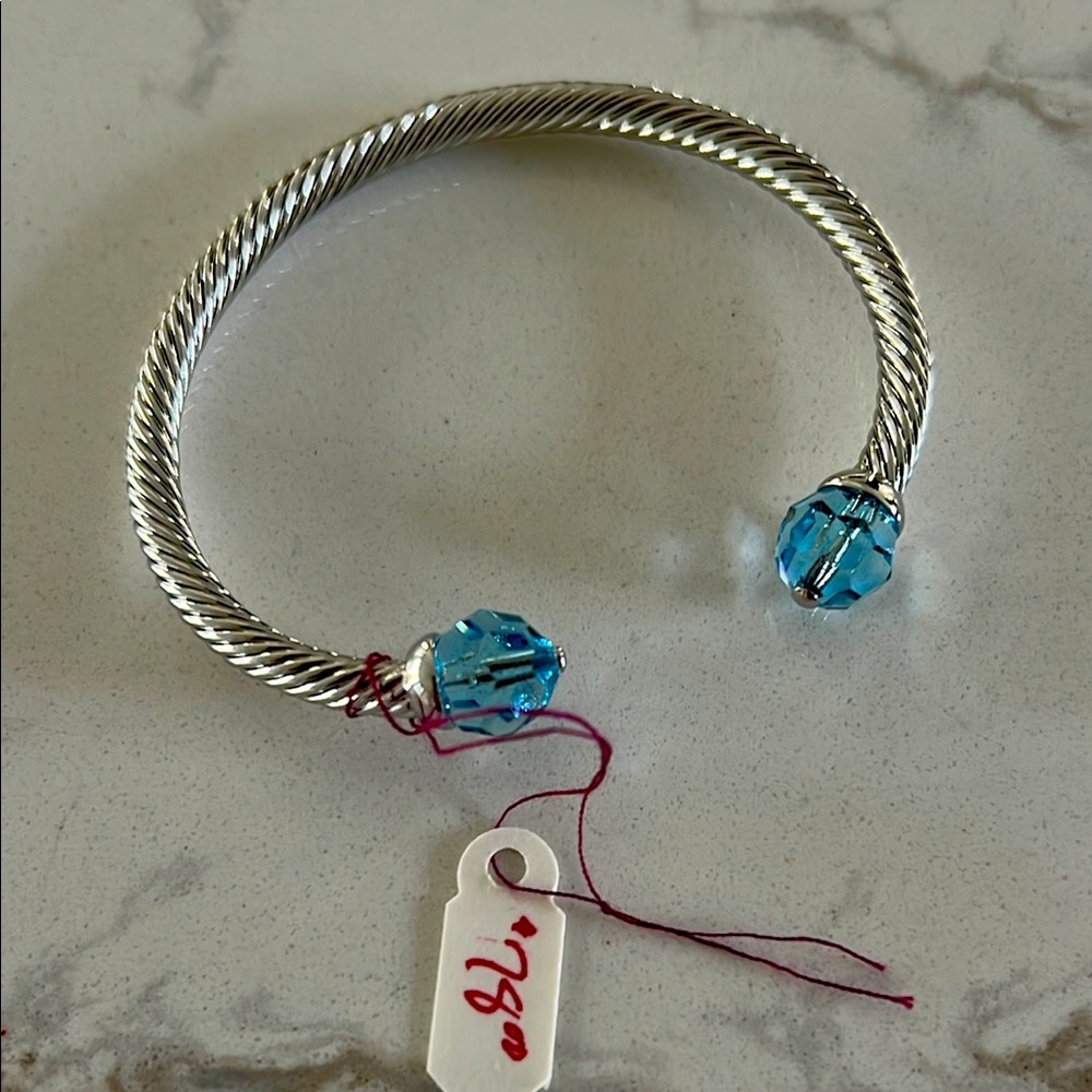 Swarovski Elegant Silver-toned and Blue gemstone bracelet